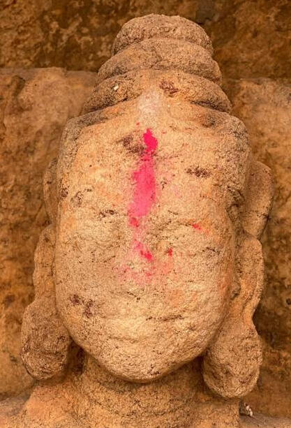 Carved stone head